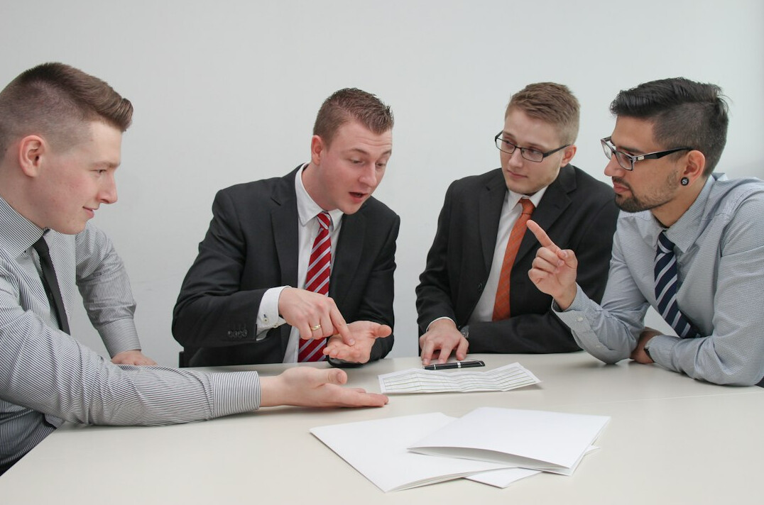 group of insurance agents talking