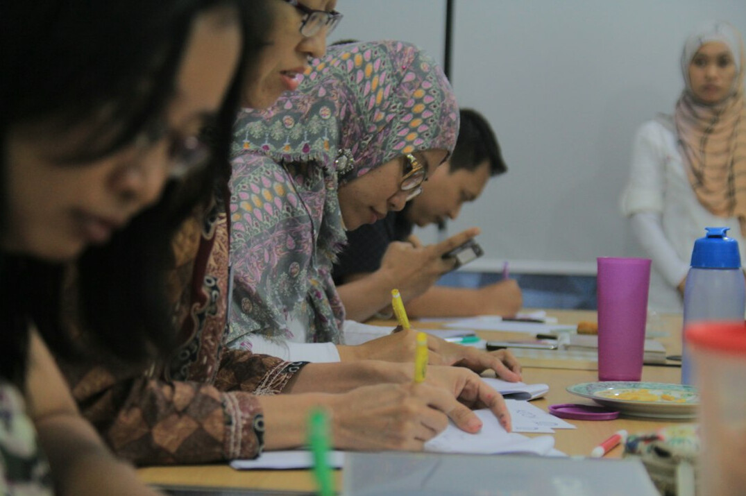 workshop participants in insurance training